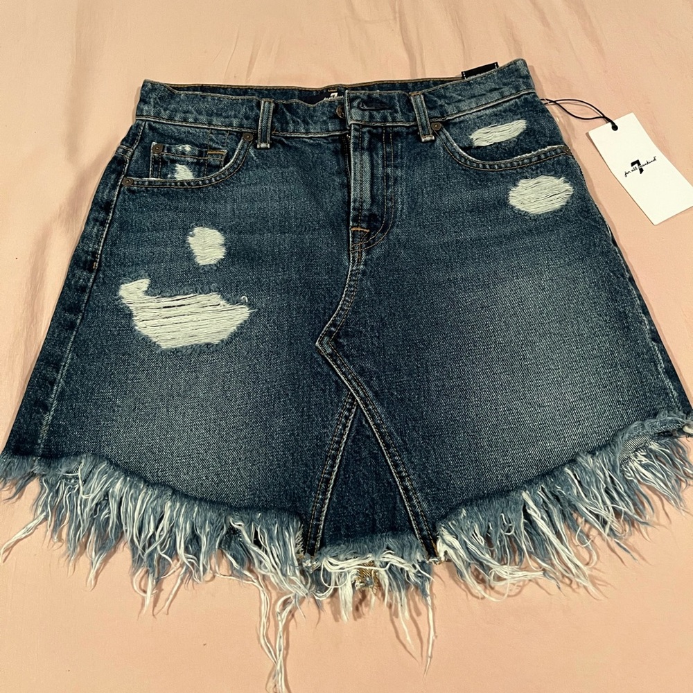 Denim mini skirt. New with tag.
